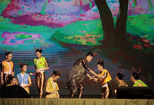 Students play stage drama for children in Malaysia